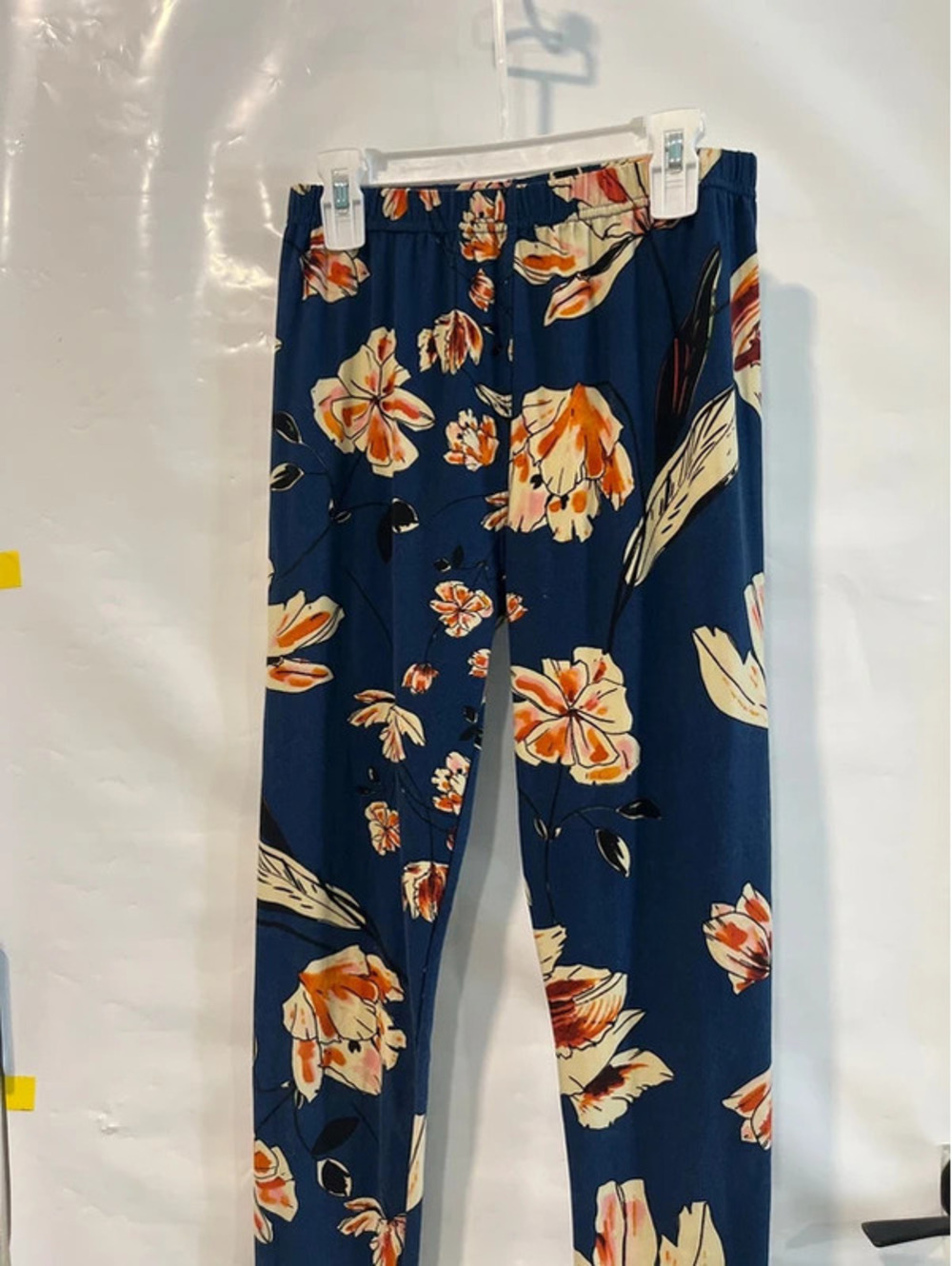 Woman’s size Small blue leggings with flours stretchy